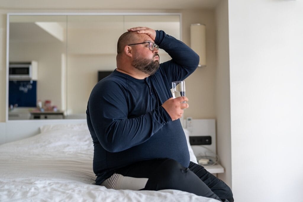 Man experiencing fatigue from skipping meals